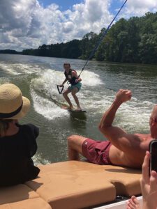 Water skiing on the lake with family and friends