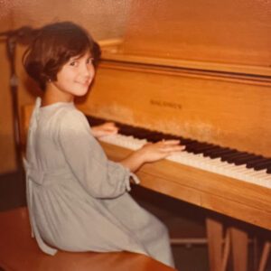 Denise playing piano